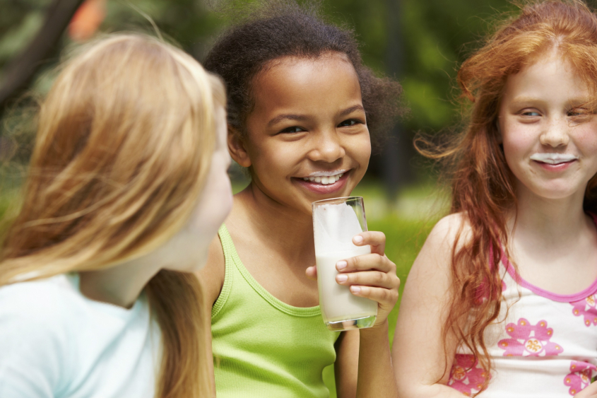 Children drinking fortified milk