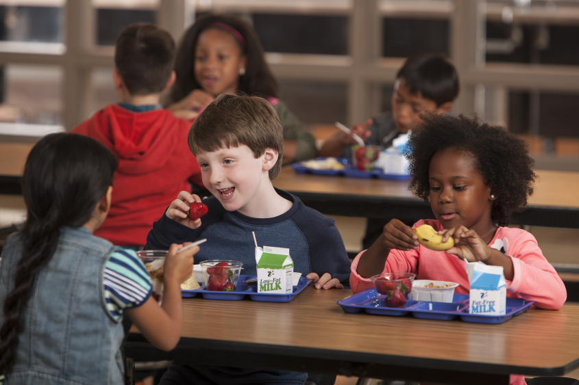 Children eating in a library