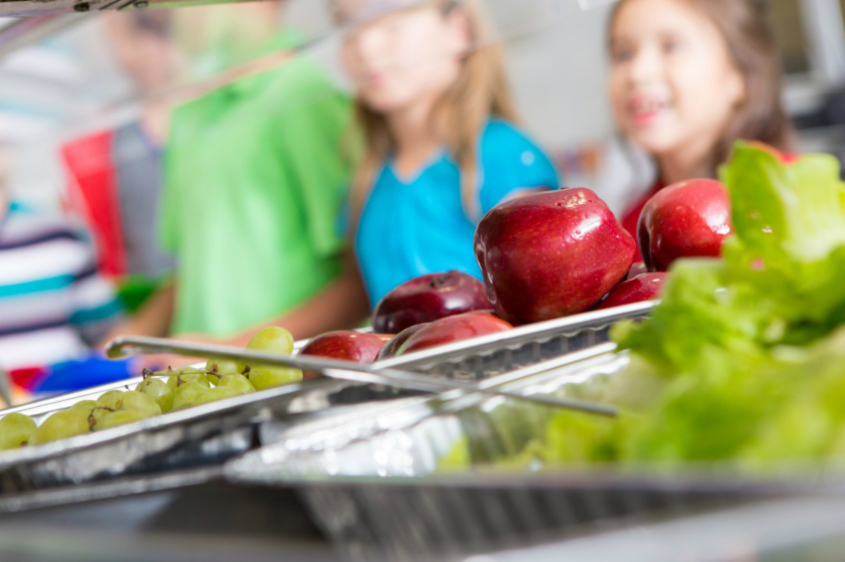 School children queuing for their lunch